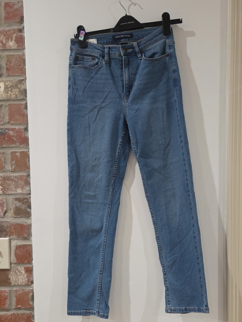 Calvin Klein Women’s Light Wash High Rise Slim Leg Jeans- 27